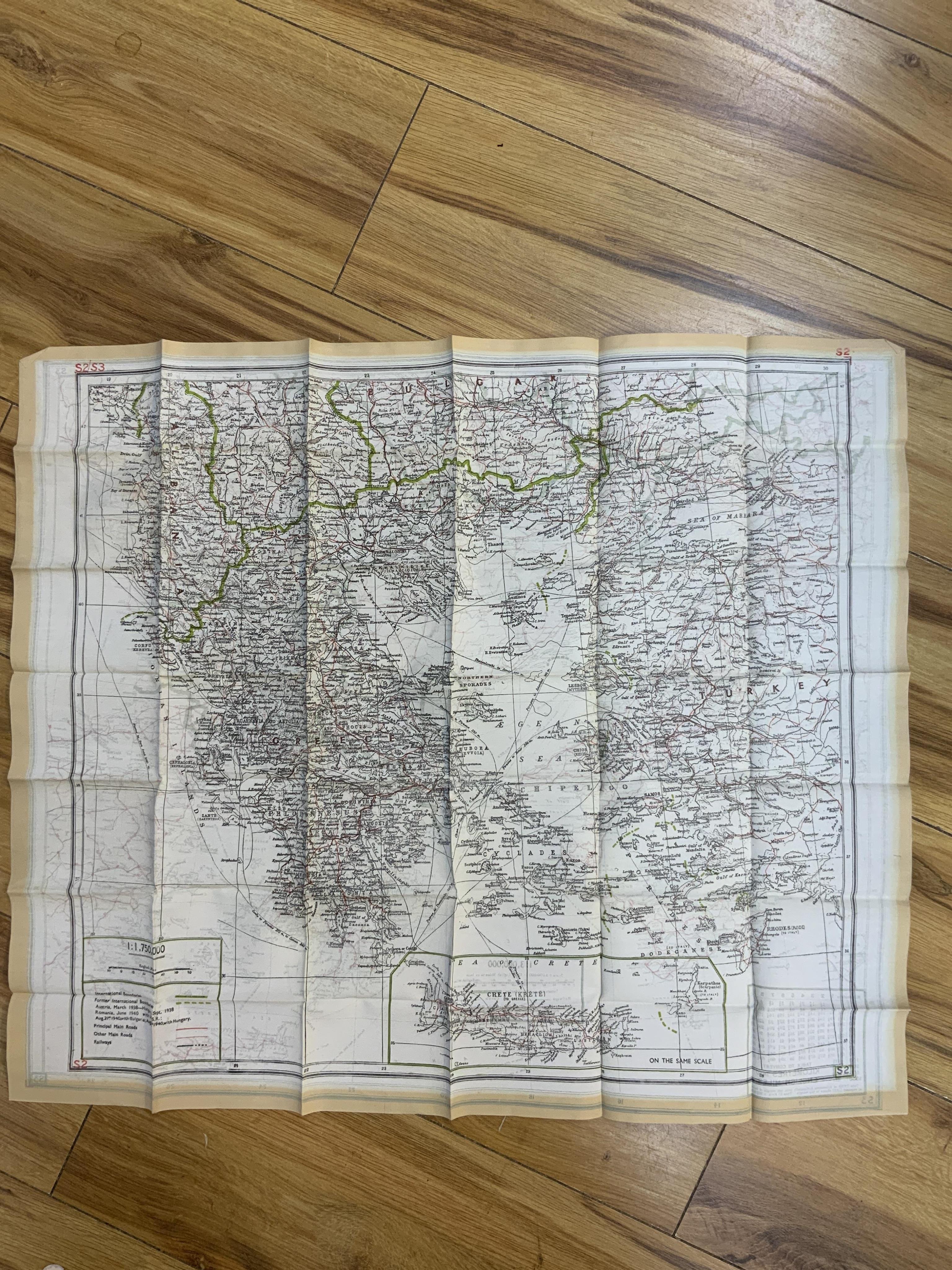 Four ‘escape’ style maps printed on silk type material, three printed double-sided; North Norway, 47x49cm, parts of Italy and Greece, 53x62cm, parts of France, 44x53cm, and a single sided map of part of the Mediterranean
